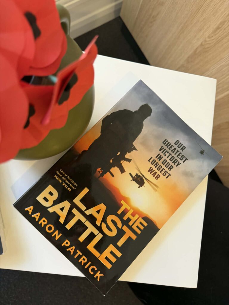 NEW BOOK at the centre, One is The Last Battle by Aaron Patrick.